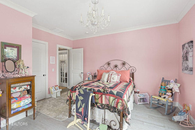 367 Barnsley Rd, Farragut, TN 37934 - bedroom with visible vents, a chandelier, baseboards, ornamental molding, and wood finished floors