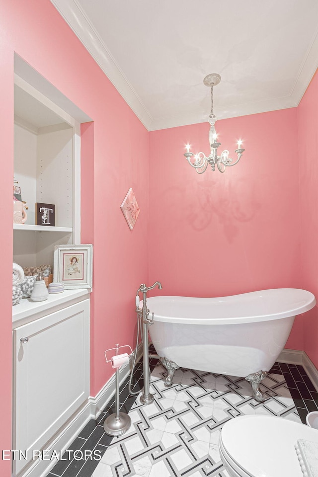 367 Barnsley Rd, Farragut, TN 37934 - bathroom featuring crown molding, an inviting chandelier, a freestanding tub, and baseboards