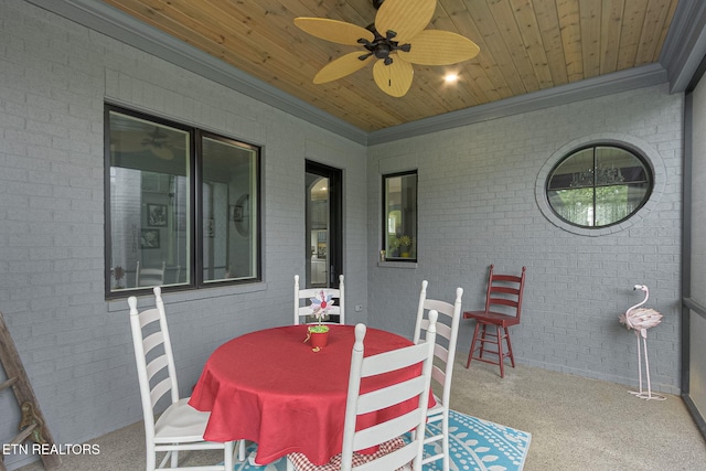 367 Barnsley Rd, Farragut, TN 37934 - carpeted dining room with ornamental molding, wooden ceiling, ceiling fan, and brick wall