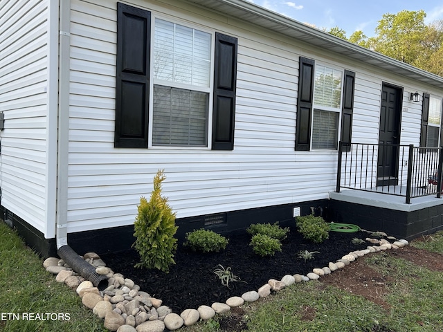 view of property exterior featuring crawl space
