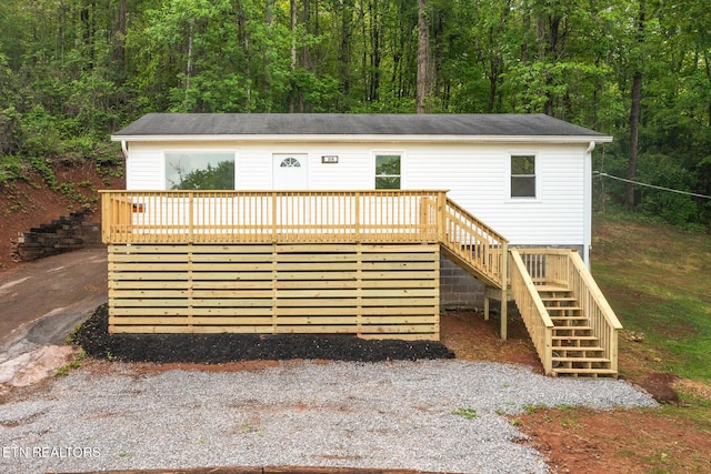 218 Jerry Ln, Knoxville, TN 37920 - view of front facade with stairs, a view of trees, and a wooden deck