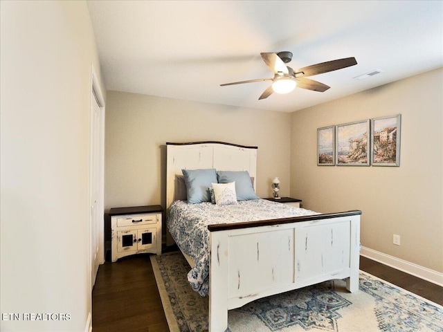 107 Mistletoeberry Rd, Oak Ridge, TN 37830 - bedroom featuring dark wood-type flooring, visible vents, ceiling fan, and baseboards