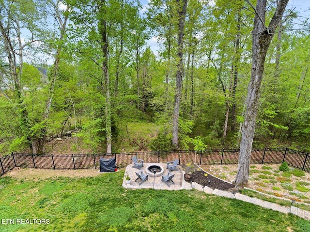 107 Mistletoeberry Rd, Oak Ridge, TN 37830 - view of yard with a patio, fence, and an outdoor fire pit