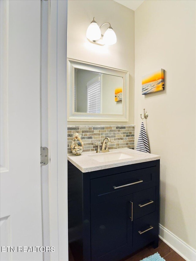 107 Mistletoeberry Rd, Oak Ridge, TN 37830 - bathroom with baseboards, tasteful backsplash, and vanity