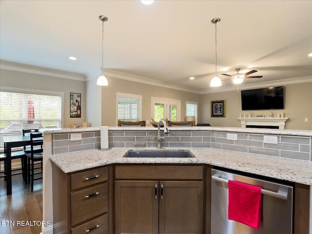 107 Mistletoeberry Rd, Oak Ridge, TN 37830 - kitchen featuring a wealth of natural light, open floor plan, dishwasher, and a sink