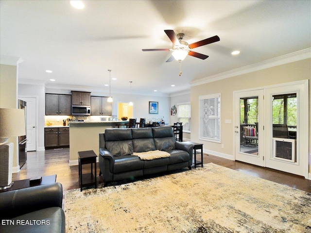 107 Mistletoeberry Rd, Oak Ridge, TN 37830 - living room featuring dark wood-style flooring, a ceiling fan, crown molding, and recessed lighting
