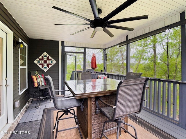 107 Mistletoeberry Rd, Oak Ridge, TN 37830 - sunroom / solarium with ceiling fan and outdoor dining area