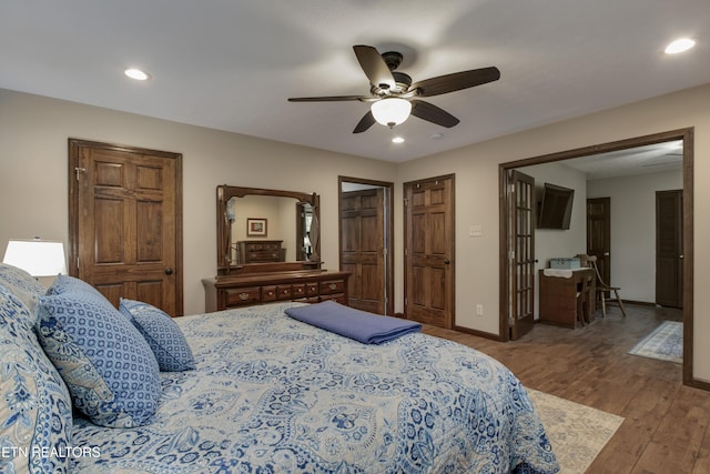 bedroom with baseboards, a ceiling fan, recessed lighting, and wood finished floors