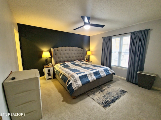 1703 Perimeter Dr, Jamestown, TN 38556 - bedroom featuring light colored carpet, a textured ceiling, and baseboards