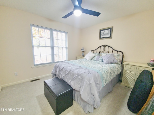 1703 Perimeter Dr, Jamestown, TN 38556 - bedroom with light colored carpet, visible vents, ceiling fan, and baseboards