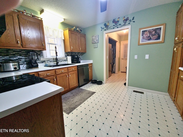 1703 Perimeter Dr, Jamestown, TN 38556 - kitchen with a sink, visible vents, light countertops, dishwasher, and light floors