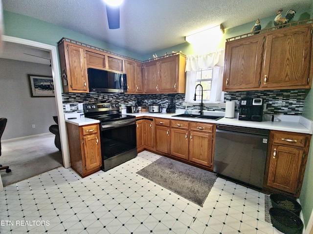 1703 Perimeter Dr, Jamestown, TN 38556 - kitchen with light floors, range with electric stovetop, light countertops, dishwasher, and a sink