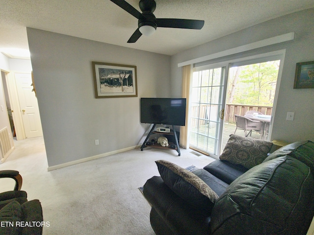 1703 Perimeter Dr, Jamestown, TN 38556 - living area featuring baseboards, carpet flooring, ceiling fan, and visible vents
