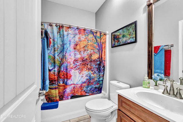 full bath with toilet, shower / tub combo, and vanity