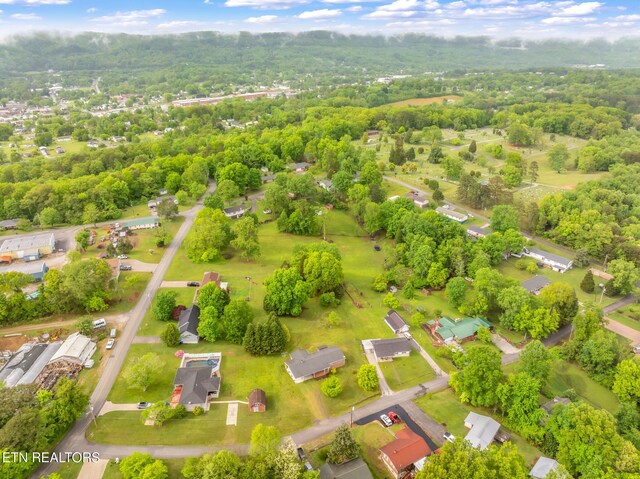 aerial view with a wooded view