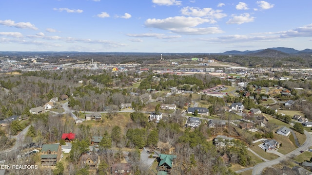 bird's eye view featuring a mountain view and a residential view