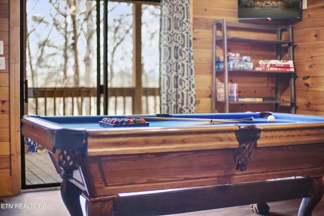 recreation room featuring wood walls and billiards