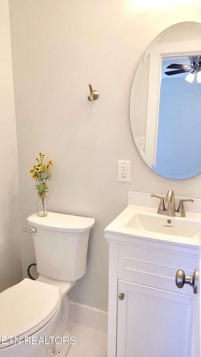 1805 Ferd Hickey Rd, Knoxville, TN 37909 - half bath with toilet, baseboards, vanity, and a ceiling fan