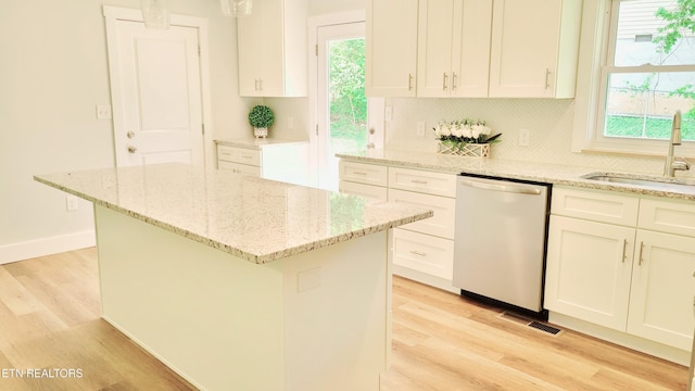 1805 Ferd Hickey Rd, Knoxville, TN 37909 - kitchen with white cabinets, dishwasher, light wood-style flooring, and a sink