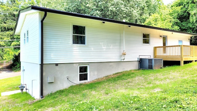 1805 Ferd Hickey Rd, Knoxville, TN 37909 - rear view of house with central AC unit, a yard, and a wooden deck