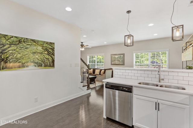 6749 Albatross Ln, Knoxville, TN 37921 - kitchen with stainless steel dishwasher, a sink, light countertops, white cabinetry, and recessed lighting