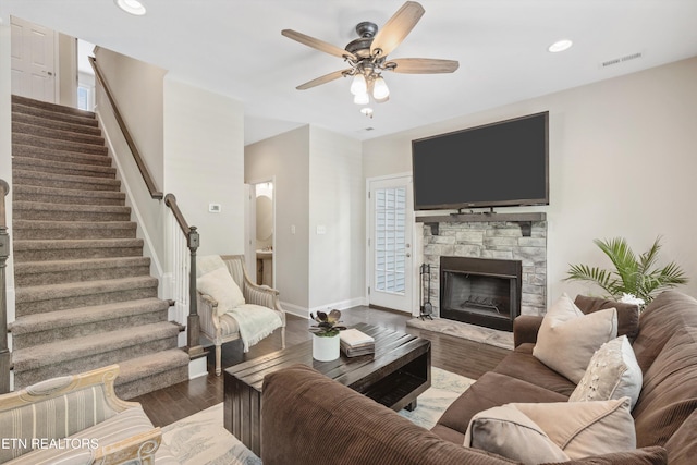6749 Albatross Ln, Knoxville, TN 37921 - living room featuring stairs, a ceiling fan, wood finished floors, baseboards, and a fireplace