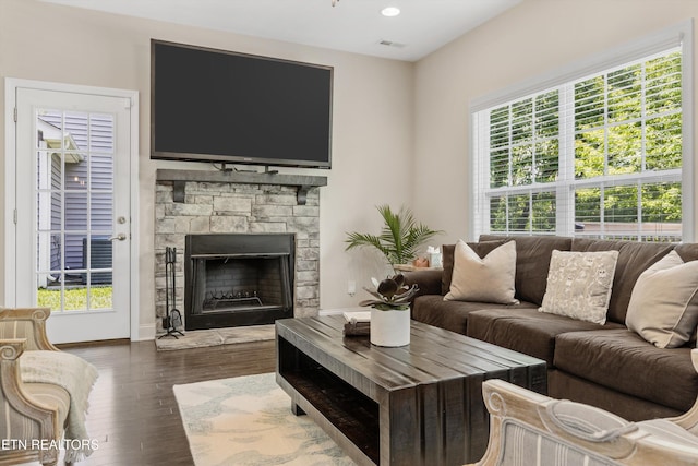 6749 Albatross Ln, Knoxville, TN 37921 - living room featuring dark wood finished floors, a fireplace, and baseboards