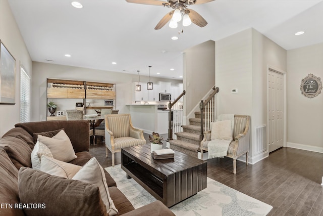 6749 Albatross Ln, Knoxville, TN 37921 - living area featuring stairway, a ceiling fan, baseboards, wood finished floors, and recessed lighting