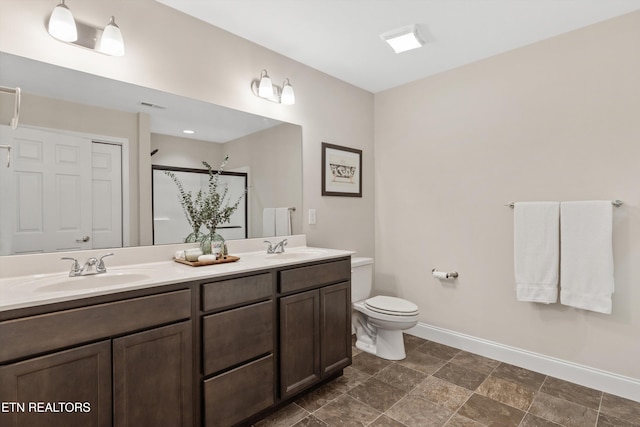 6749 Albatross Ln, Knoxville, TN 37921 - full bath featuring baseboards, toilet, double vanity, and a stall shower