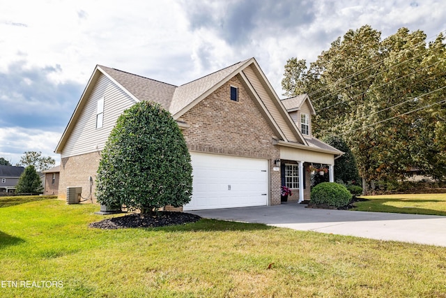 view of home's exterior with an attached garage, brick siding, cooling unit, a yard, and driveway