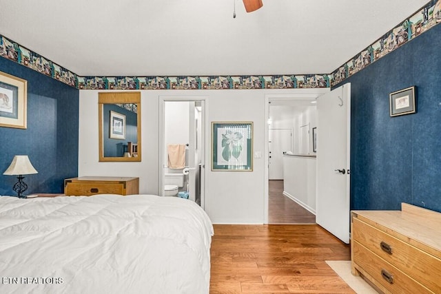 67 Eagle Ct, Crossville, TN 38558 - bedroom with ceiling fan, baseboards, wood finished floors, and ensuite bath