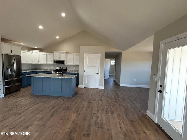 257 Colby Cir, Crossville, TN 38571 - kitchen featuring a sink, an island with sink, white cabinets, appliances with stainless steel finishes, and open floor plan