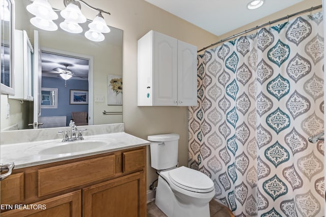 full bath with vanity, ceiling fan with notable chandelier, toilet, and a shower with shower curtain