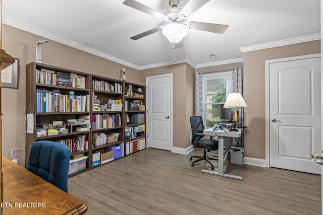 office with baseboards, crown molding, wood finished floors, and ceiling fan