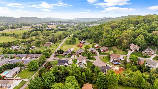drone / aerial view with a mountain view and a residential view
