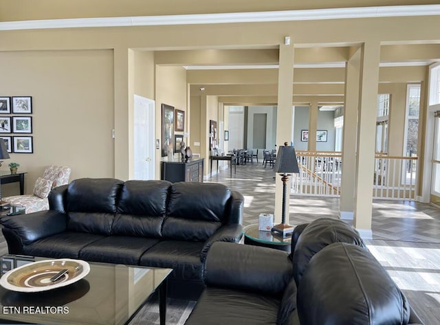living room with ornamental molding