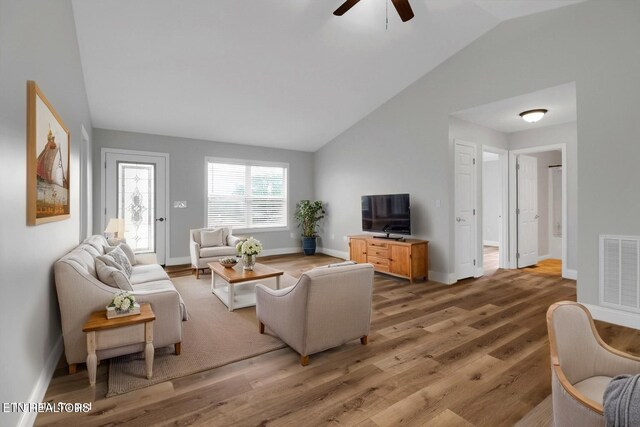 1228 Allardt Hwy, Jamestown, TN 38556 - living room with lofted ceiling, ceiling fan, light wood-style flooring, and baseboards