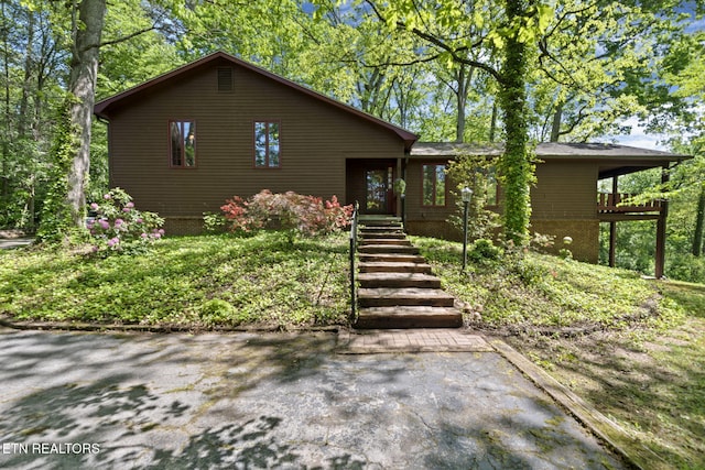 chalet / cabin with stairway