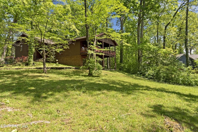view of yard with a deck