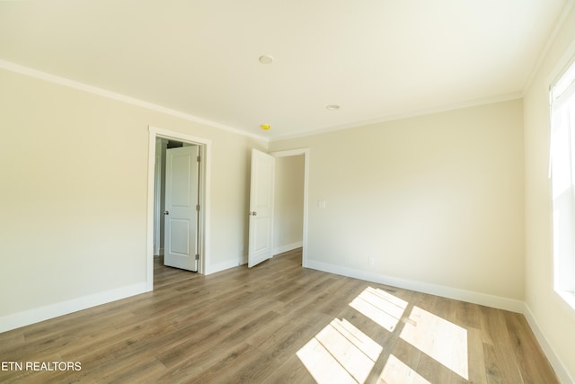 2128 Duncan Rd, Maryville, TN 37803 - unfurnished room with light wood-type flooring, crown molding, and baseboards