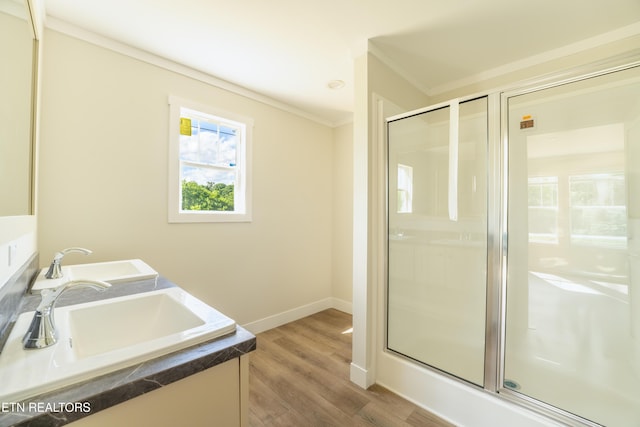 2128 Duncan Rd, Maryville, TN 37803 - full bath featuring a shower stall, ornamental molding, double vanity, baseboards, and wood finished floors