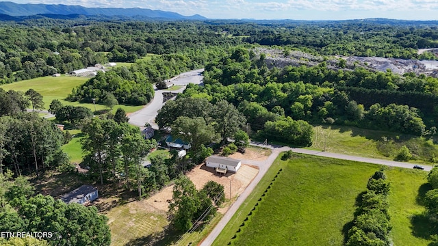 2128 Duncan Rd, Maryville, TN 37803 - aerial view of property's location with a heavily wooded area and a mountainous background