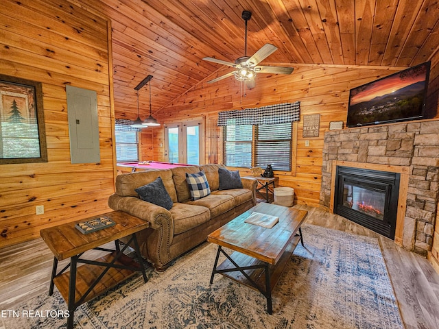 living room featuring wooden ceiling, electric panel, wooden walls, vaulted ceiling, and wood finished floors