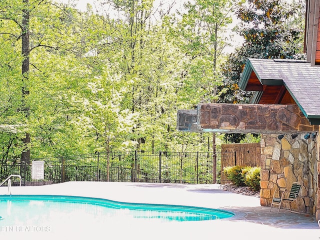 view of pool featuring fence and a fenced in pool