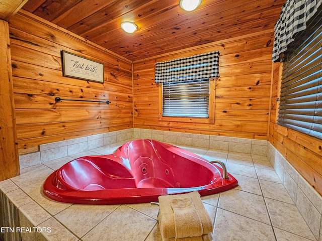 full bathroom with a whirlpool tub, wooden ceiling, wood walls, and tile patterned floors