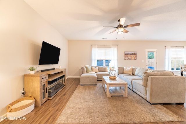 7849 Beeler Farms Ln, Knoxville, TN 37918 - living area featuring ceiling fan, baseboards, and light wood-type flooring