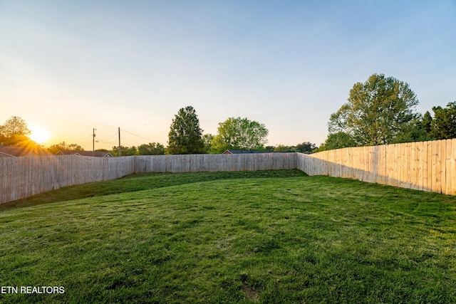 7849 Beeler Farms Ln, Knoxville, TN 37918 - yard at dusk featuring a fenced backyard