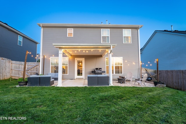 7849 Beeler Farms Ln, Knoxville, TN 37918 - rear view of property featuring a patio, a fenced backyard, an outdoor living space with a fire pit, and a lawn