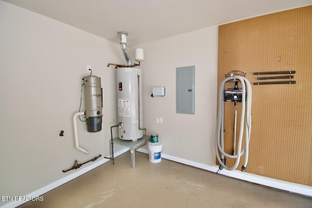 utility room featuring gas water heater and electric panel