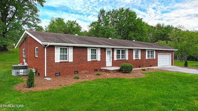 ranch-style house featuring crawl space, driveway, a front yard, a garage, and brick siding